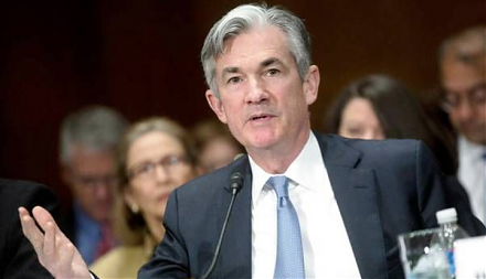 Federal Reserve Chair Jerome Powell announces the monetary policy decision to lower the federal funds rate by a quarter point to 2%-2.25%.