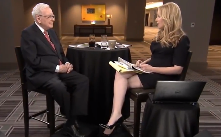 CNBC news anchor Becky Quick interviews Warren Buffett in light of the rece...