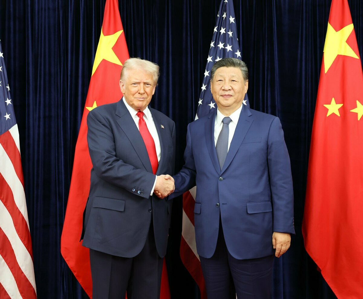 President Donald Trump shakes hands with President Xi Jinping to discuss the new trade deal between both the U.S. and China. 
